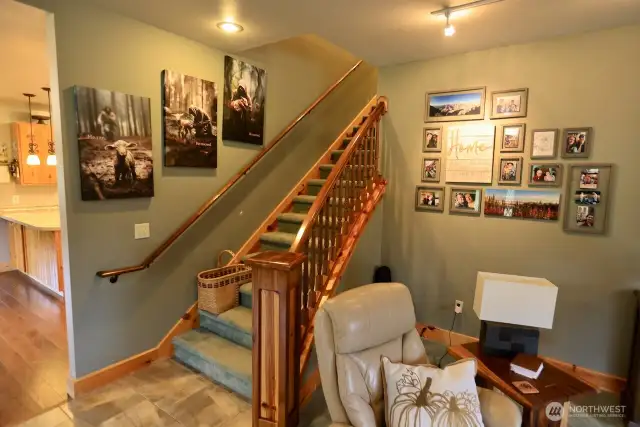 Custom wood work featured in the elegant staircase.
