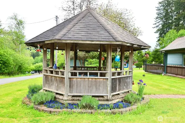 Gazebo out front creates a peaceful outdoor space.