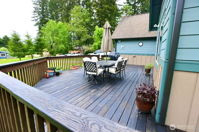 Large deck off the dining room provides expanded space.