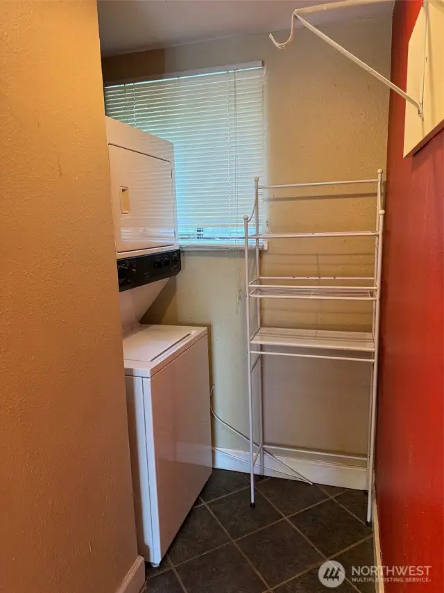 hall to suite bathroom with second laundry