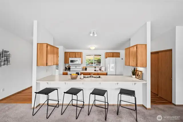 Functional layout with generous cabinet and counter space & ideal for entertaining.
