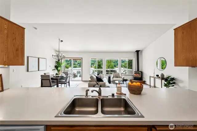 Open-concept floor plan with spacious flow between kitchen, dining, and living areas