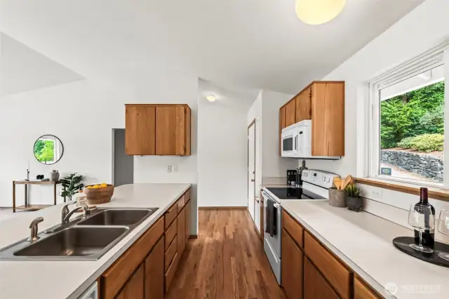 Oak Hardwood floors throughout kitchen