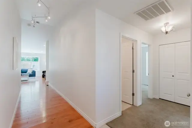 Looking from the front door down the hall to your living room