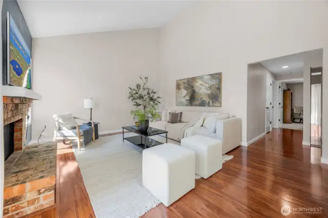 Open concept space with plenty of natural light and soaring vaulted ceilings