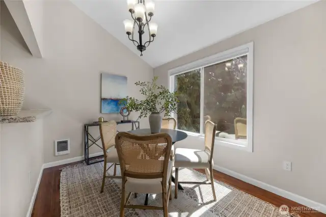 spacious dining room with tons of natural light and large picture window