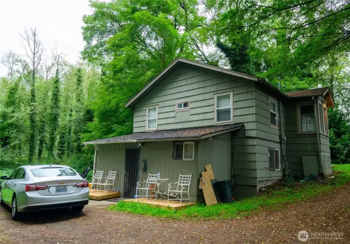 The existing house has 2 conforming bedrooms and 1 bathroom upstairs with a separate, non-conforming unit below with 3/4 bath. Both spaces have tenants paying monthly rent. Tenants prepared to move with proper notice.