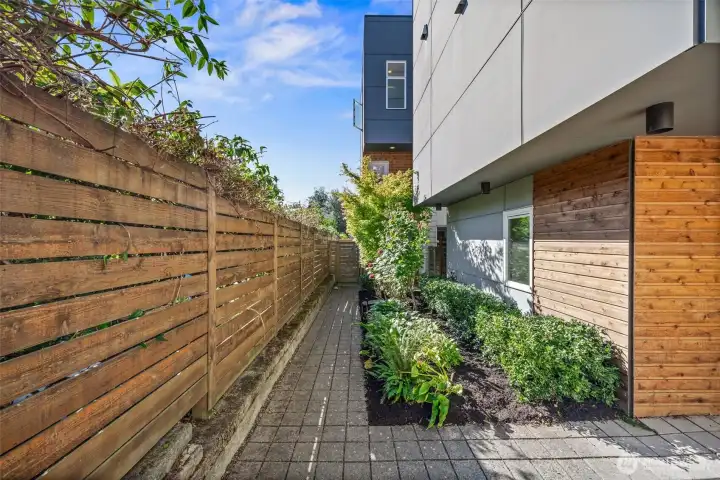 Beautifully landscaped entry way.