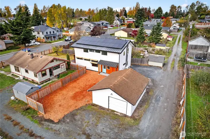 Arial image of the home from above the alley looking north.
