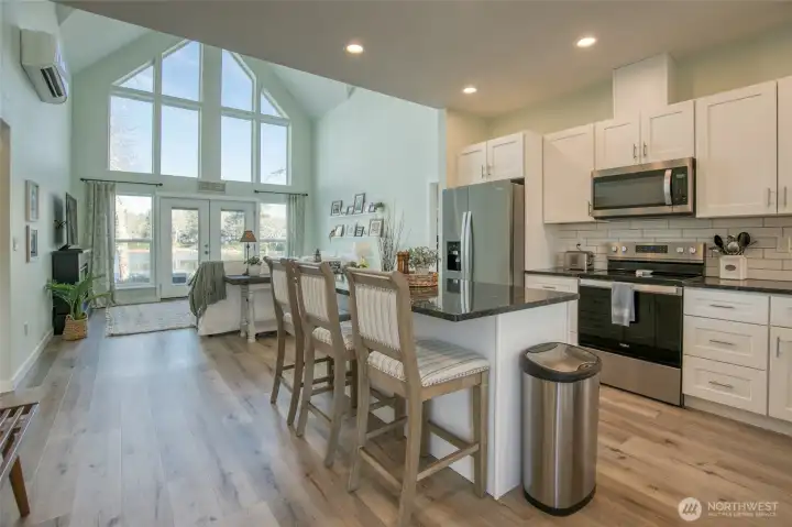Open, airy floor plan. Floor-to-ceiling windows bathe the room in light no matter what the weather is outside.