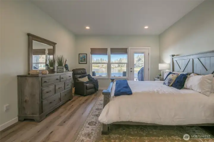 Primary bedroom with serence lake views