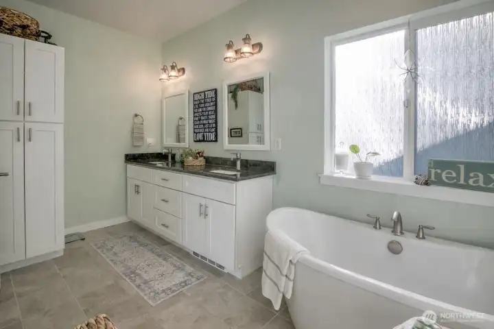 Spa-like bathroom with plenty of storage