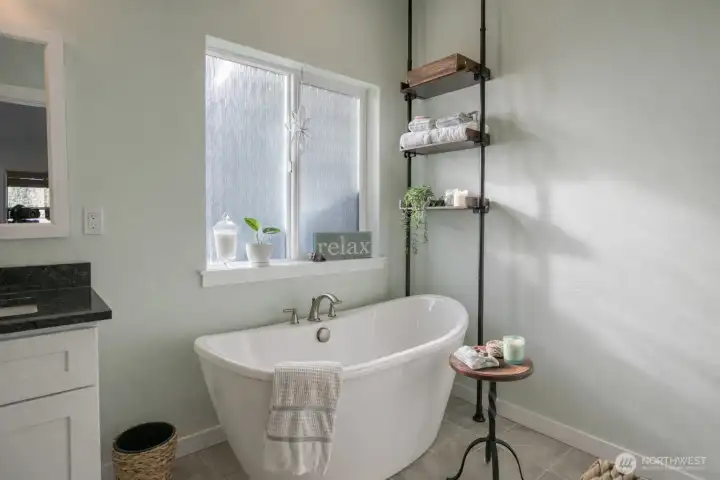 Luxurious free standing soaking tub. Feel like your on vacation every day!