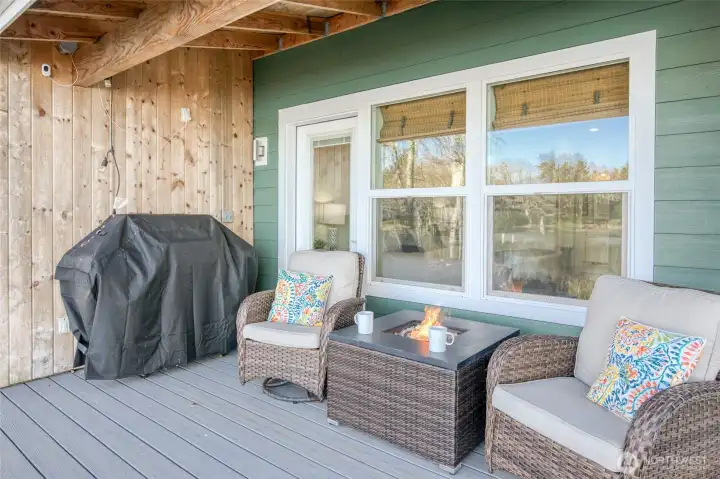Covered deck off the primary bedroom is the perfect place to relax, have a cup of coffee and enjoy the wildlife on the lake