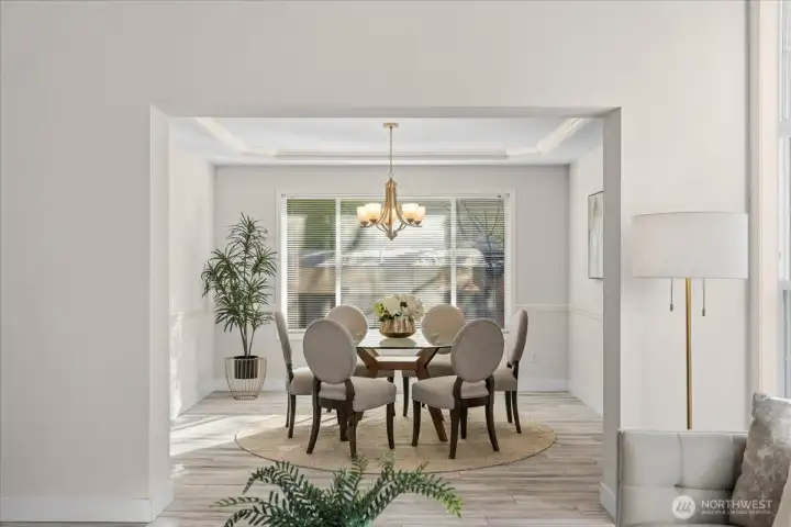 Formal dining room conveniently located between the living room and kitchen