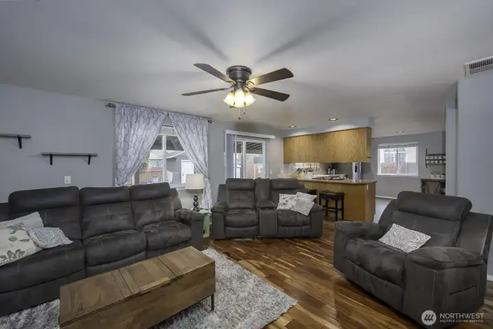 Large windows + access to the  back patio / backyard