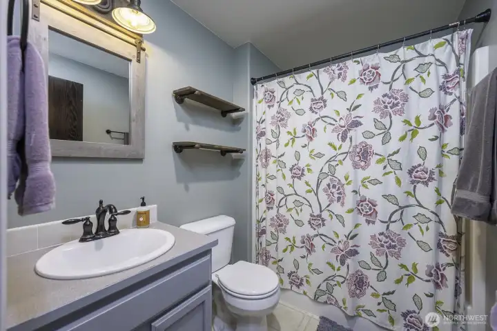 Shared Bathroom located upstairs