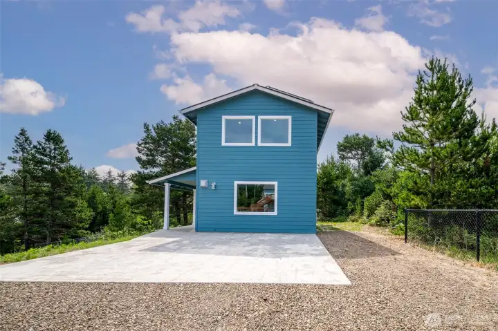 Plenty parking space plus additional RV parking spot with power and septic access