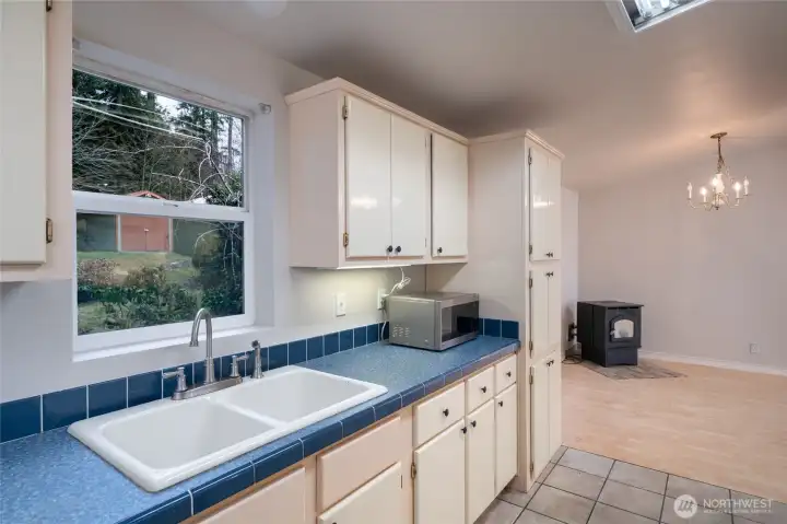 Sink Area Peers into Spacious Yard