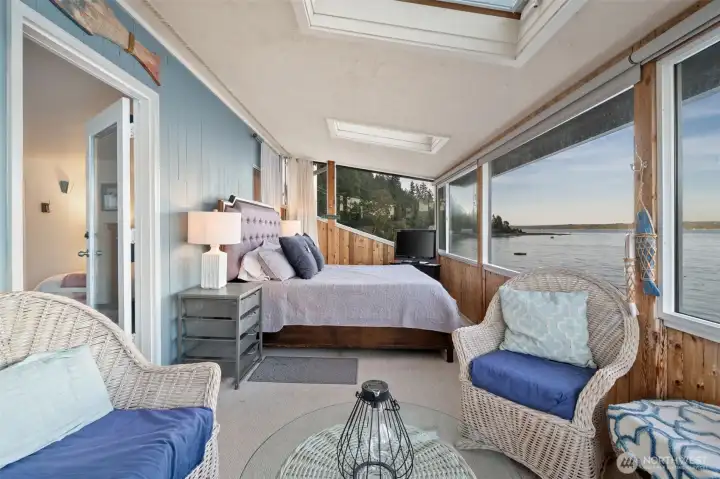 Sunroom just off the primary suite. Currently used as a bedroom but could easily be converted to an amazing office/den.