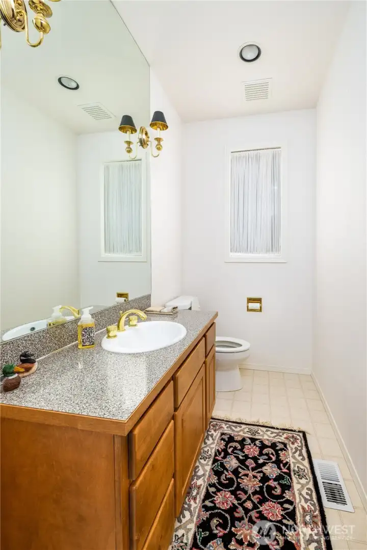 Powder room on main floor, makes hosting easy.