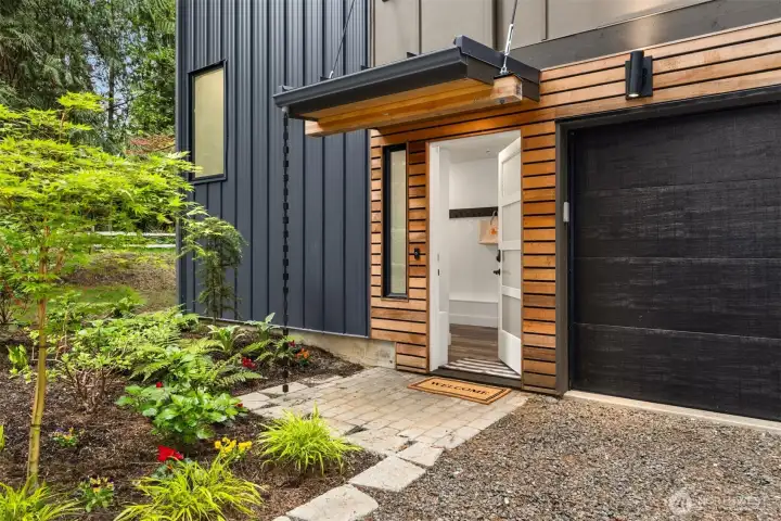 Clean architectural lines and a modern aesthetic...welcomes you inside.