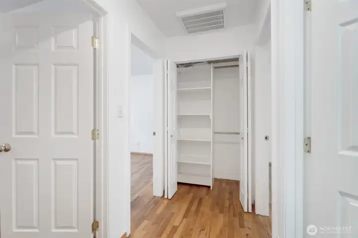 Hallway with linen closet