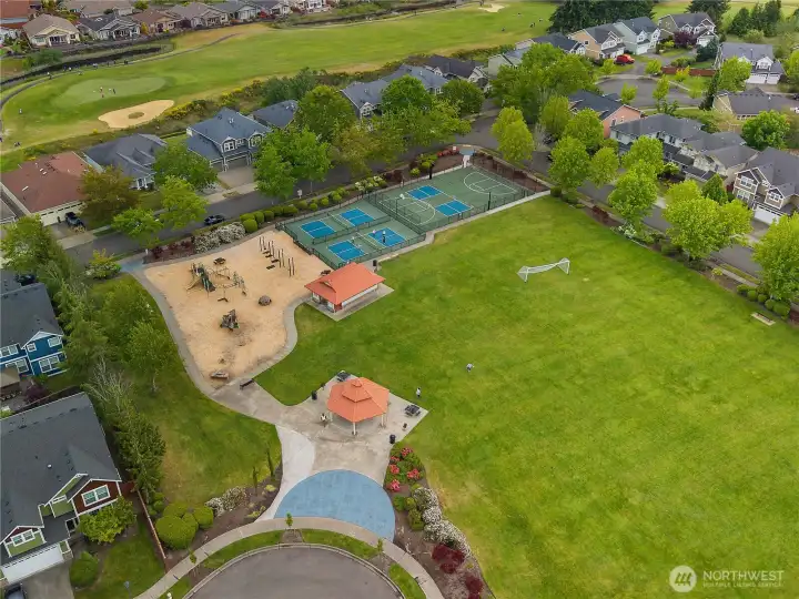 Soccer field, athletic courts, playground, and The Links Golf Course in the background.