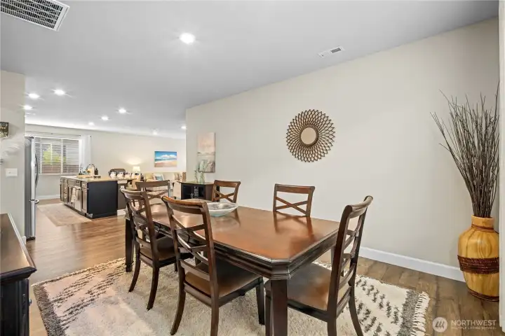 Dining room flows into open-concept living Dining room flows into open-concept living