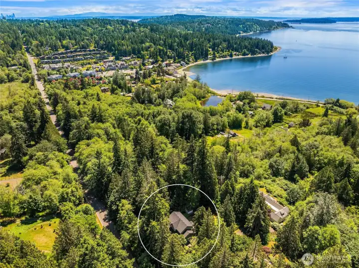 This aerial photo shows where the home is located off Baker Hill Road and near the beach and all the happenings at the Village.  Blakely Elementary School is located at the top of Baler Hill to the left.