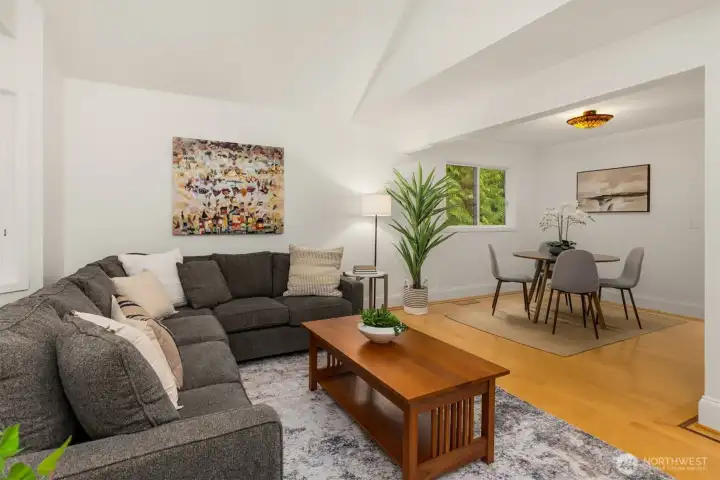 Behind the living room couch is a Bay Window.