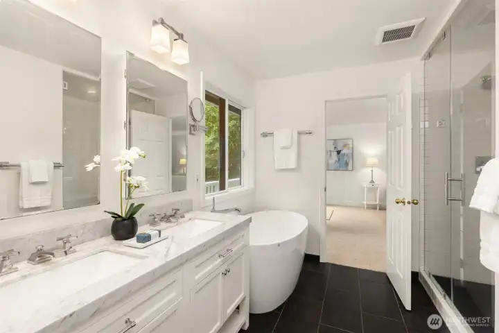 Primary Bathroom with separate tub and shower.
