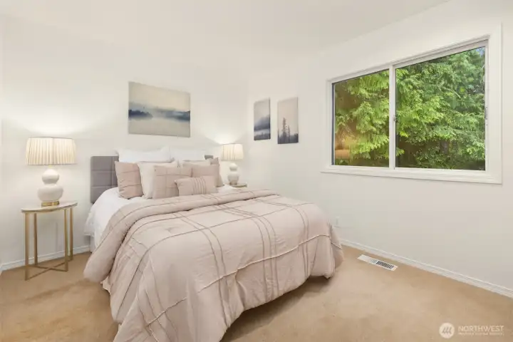 1st guest room at the end of the hall.