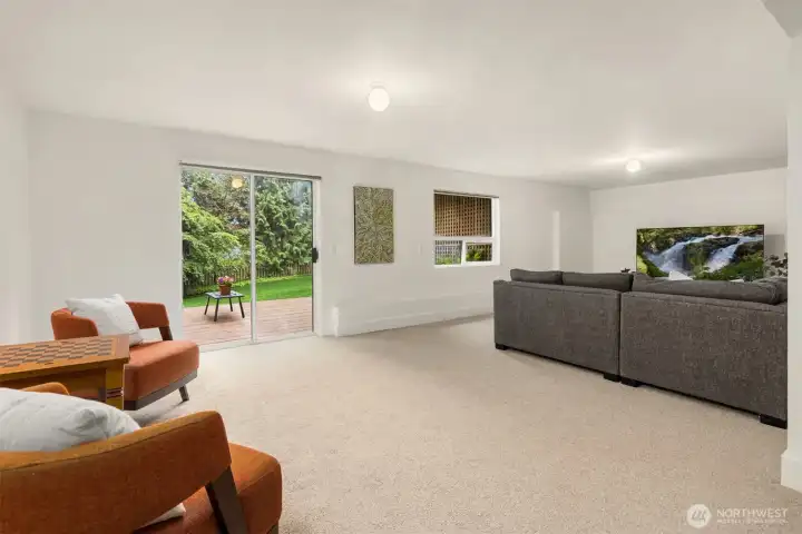 Sliding doors from the family/rec room lead to the outside deck.