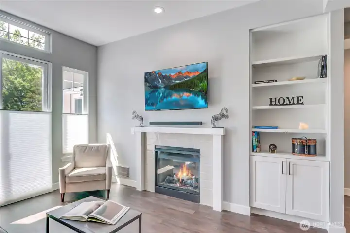 The beautiful dual sided gas fireplace keeps you warm in the winter
