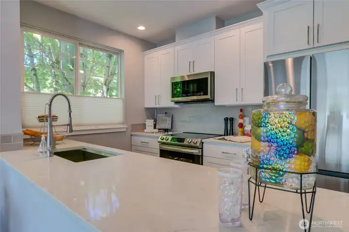 Large kitchen with plenty of prep / serve countertops