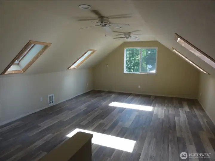 Upstairs finished off adding a large family room and primary bedroom. Upstairs finished off adding a large family room and primary bedroom.