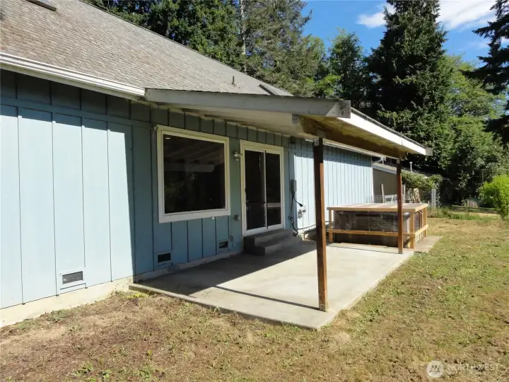 Rear of home with covered patio. Rear of home with covered patio.