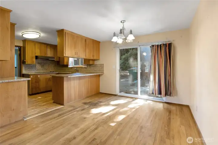 Updated kitchen counters, granite with full tile backsplash, very nice.