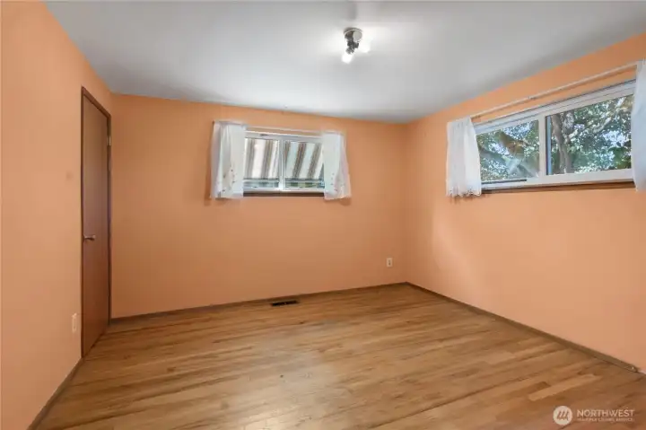 Welcome to the primary bedroom! plenty of room for almost any sized bedroom furniture