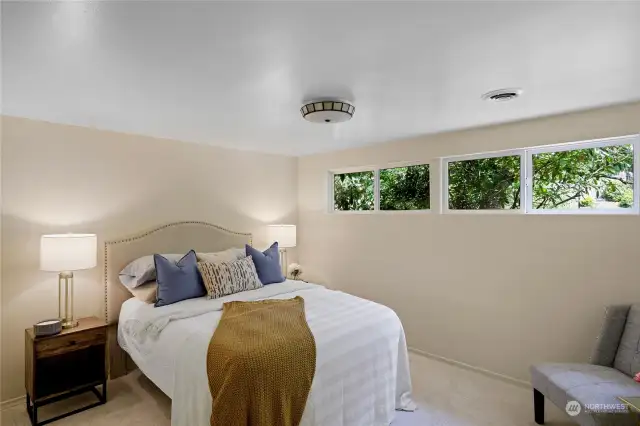 This is the largest bedroom at the front of the house and has been used by the current owner as the master bedroom.  Wonderful privacy, soft lighting, room for an extra sitting area and dressers.....  Truly a wonderful retreat!