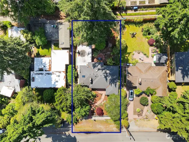 Here is the home outlined in dark blue as seen from the drone camera.  That is a nearly 8,000 square foot lot.