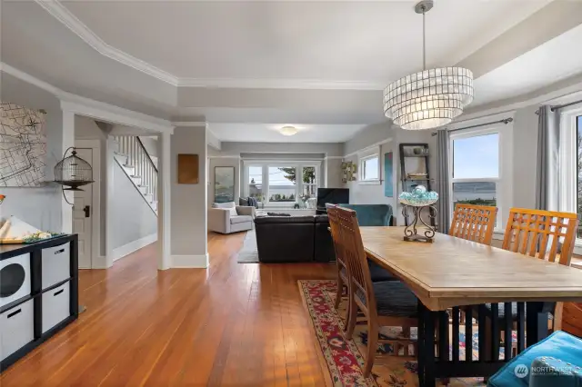 Formal dining area has a vibrant open concept.