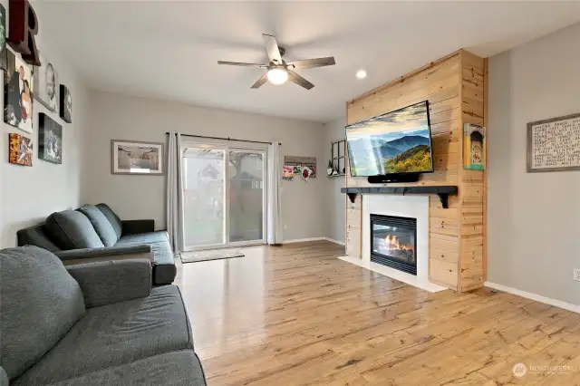 Family room  shiplap wrapped gas fireplace