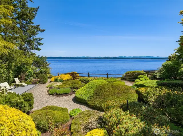 Platform deck to left features epic views amongst the bucolic gardens.