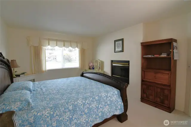primary bedroom with fireplace