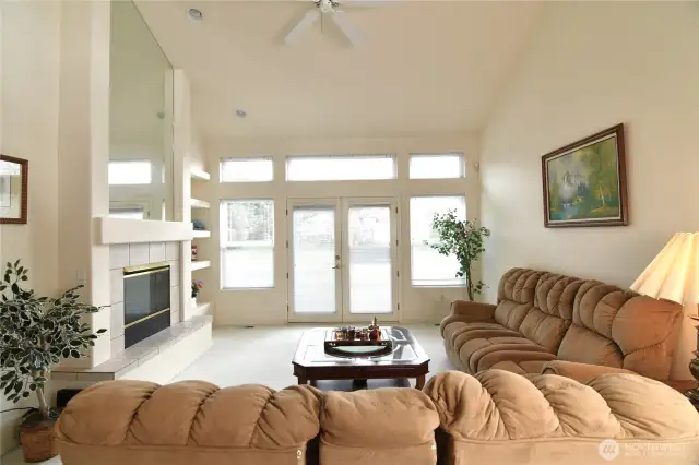 living room with door to backyard