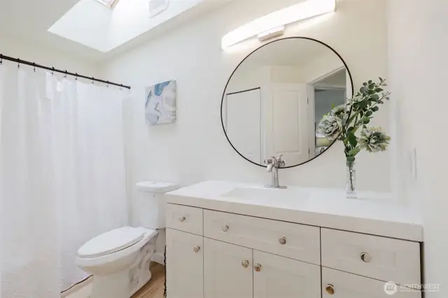 Hall bathroom upstairs. Bathroom sits between 2nd & 3rd bedrooms.