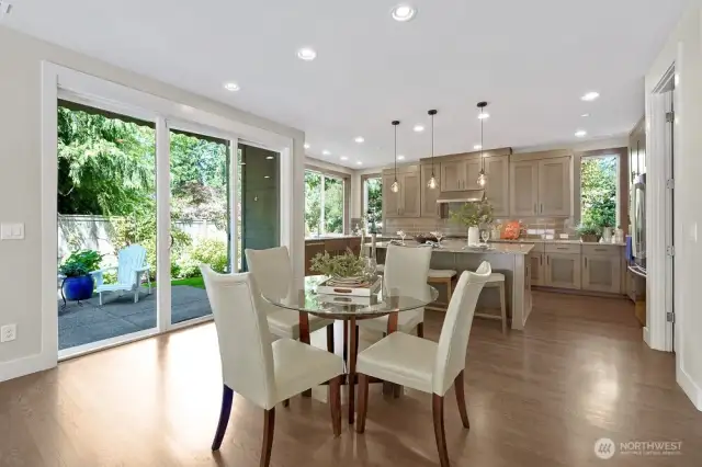 Another view of the breakfast nook looking into the kitchen. The Cherry cabinets bring a warm and rich elegance to the kitchen while keeping the space practical and functional. This kitchen is perfect for both everyday cooking and stylish entertaining