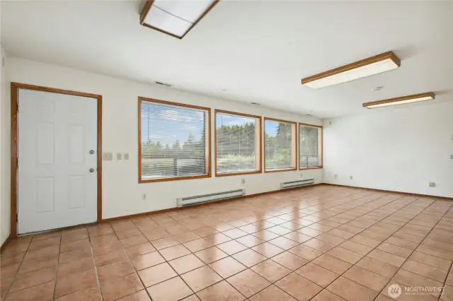 Downstairs living room/dining room/plumbed for kitenette